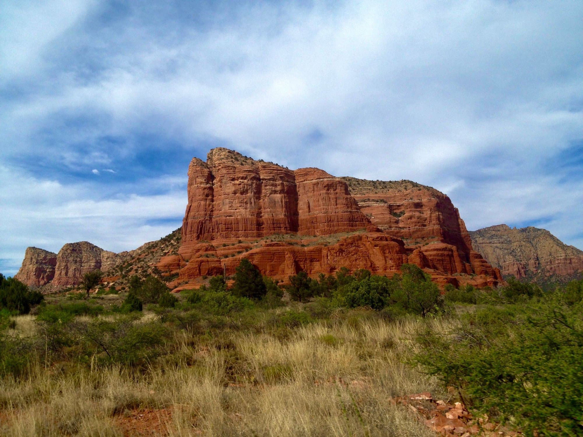 Red rock butte under cloudy sky near Sedona, Arizona